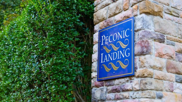 Outdoor Stone entry with Peconic Landing Sign