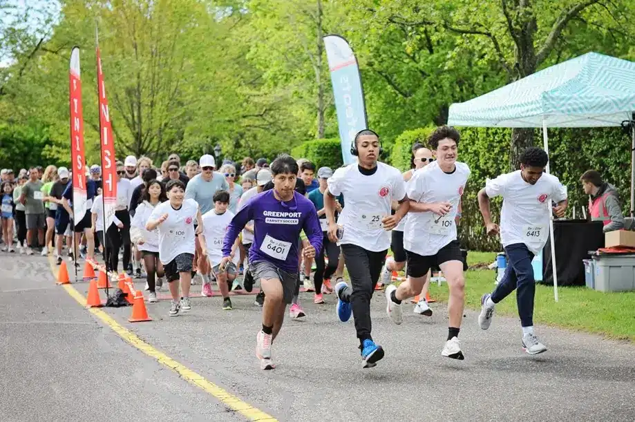 runners โข Peconic Landing The starting line at the 2025 John May Mile and 5K Race.