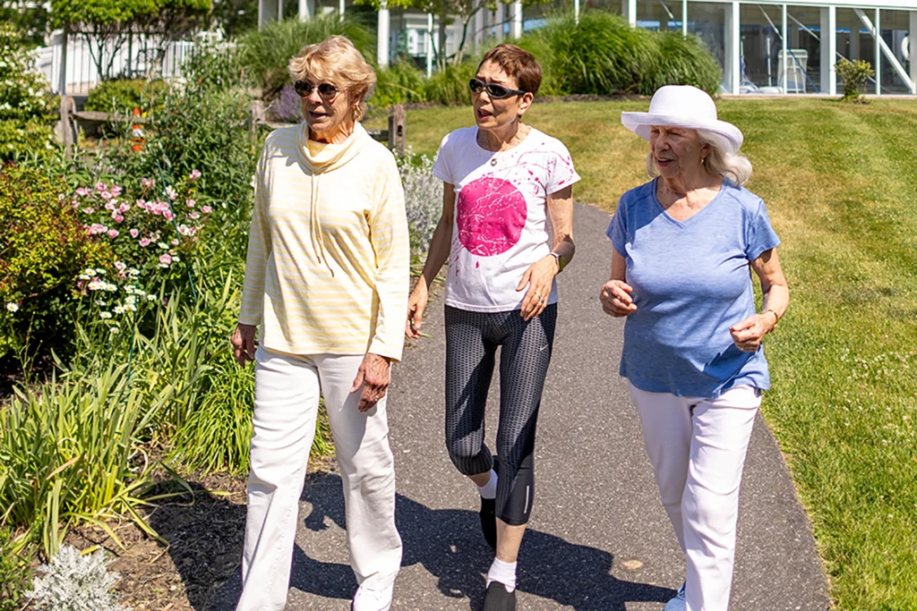 Ladies walking around Peconic Landing campus